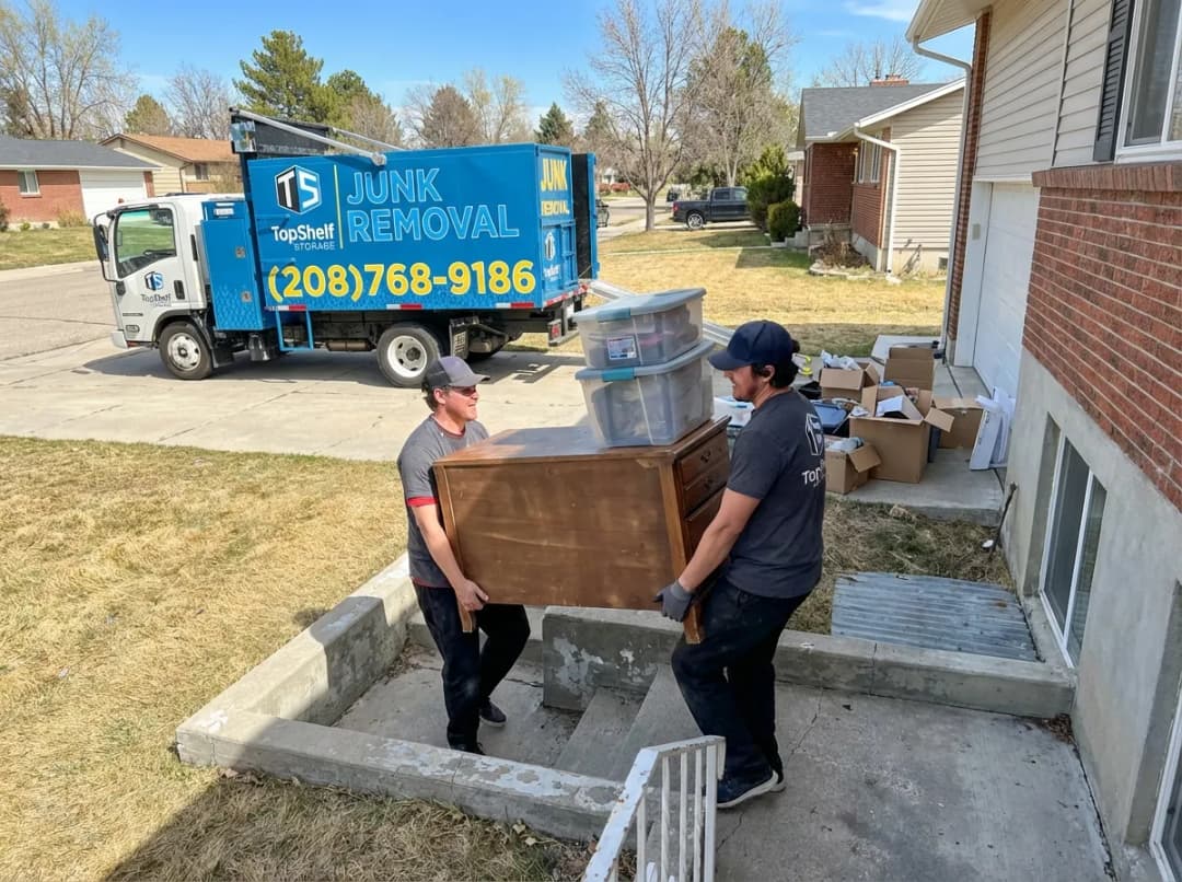 Top Shelf crew removing basement contents from a residential property in Meridian Idaho