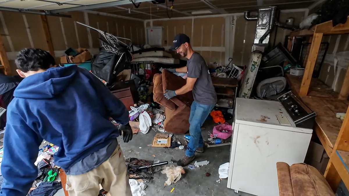 Top Shelf crew performing a full garage cleanout in Nampa Idaho