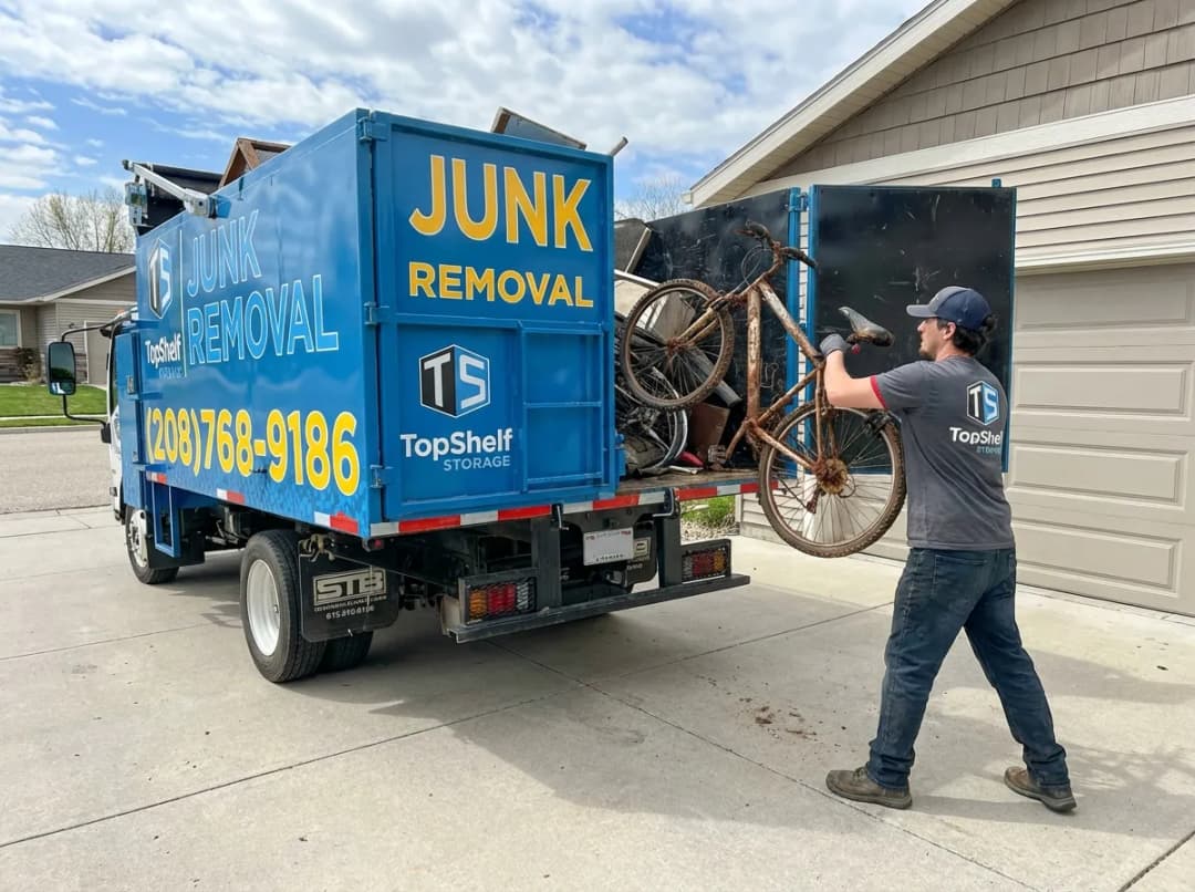 Top Shelf crew removing an old bicycle from a residential property in Eagle Idaho