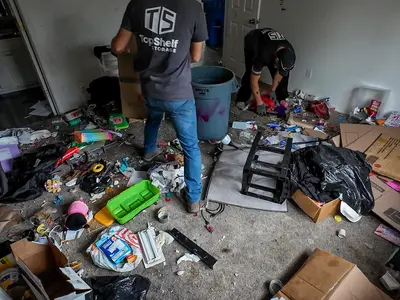 Top Shelf cleanout crew clearing household junk from a Nampa property